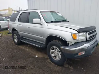 1999 Toyota 4Runner SR5 z VIN JT3HN86RXX0232435, wystawiony jako IAAI lot #41473618 z przebiegiem 267 054 mil mil oraz . Historia ofert i sprzedaży dostępna na DreamBid. Obrazek 1.