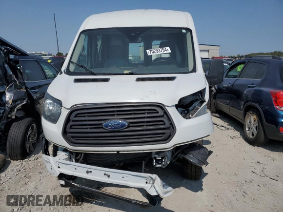 2016 Ford Transit Cargo z VIN 1FTYR2CM3GKB31134, wystawiony jako Copart lot #70293794 z przebiegiem 65 457 mil mil oraz Szkoda całkowita • Salvage title. Historia ofert i sprzedaży dostępna na DreamBid. Obrazek 5.
