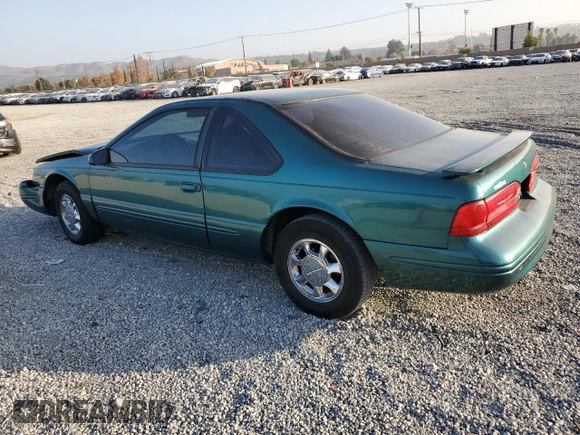 1997 Ford Thunderbird LX z VIN 1FALP62W4VH170423, wystawiony jako Copart lot #83379614 z przebiegiem 93 117 mil mil oraz Szkody całkowita. Historia ofert i sprzedaży dostępna na DreamBid. Obrazek 2.