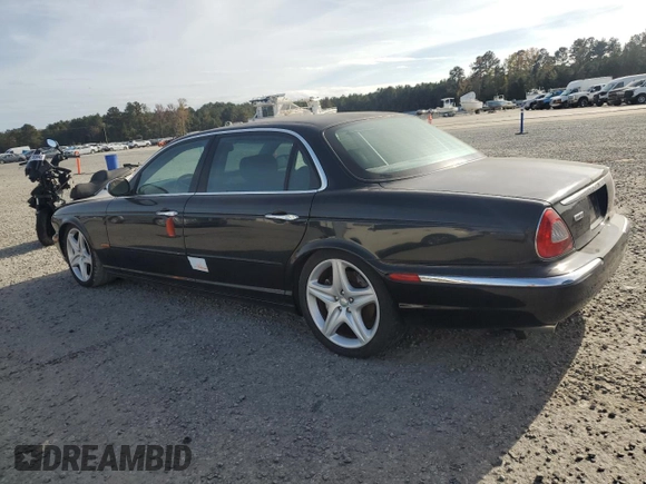 2005 Jaguar XJ Vanden Plas with VIN SAJWA82B05TG47030, listed as a Copart auction lot 41040574 with 114,520 mi miles and Salvage Title. Bid and sale history available at carsss.com. Image 2.