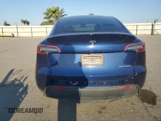 2023 Tesla Model Y Long Range with VIN 7SAYGDEE7PA146322, listed as a Copart auction lot 54071165 with 38,334 mi miles and Salvage Title. Bid and sale history available at DreamBid. Image 6.