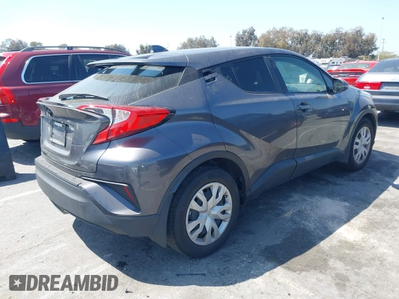 2021 Toyota C-HR LE with VIN JTNKHMBX0M1126776, listed as a IAAI auction lot 41955661 with 81,272 mi miles. Bid and sale history available at carsss.com. Image 4.
