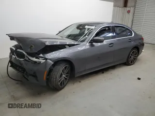 2019 BMW 3 Series 330i with VIN WBA5R1C56KFH04731, listed as a Copart auction lot 56854405 with 99,999 mi miles and Clean title. Bid and sale history available at DreamBid. Image 1.