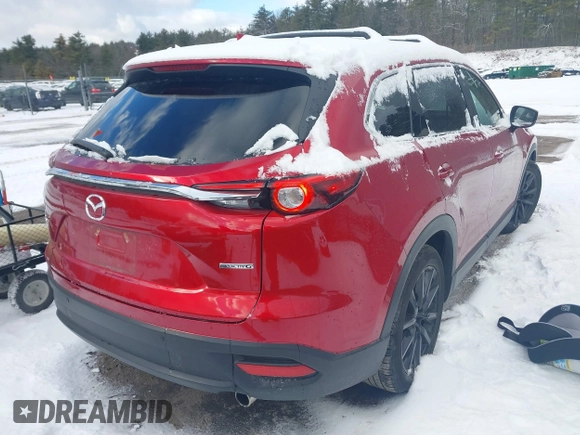 2022 Mazda CX-9 Touring Plus z VIN JM3TCBAY0N0619152, wystawiony jako IAAI lot #41489705 z przebiegiem 18 664 mil mil oraz . Historia ofert i sprzedaży dostępna na DreamBid. Obrazek 4.