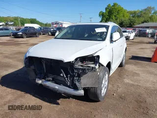 2014 Audi Q7 Premium Plus with VIN WA1LMAFE8ED012398, listed as a IAAI auction lot 42276962 with 131,012 mi miles and . Bid and sale history available at DreamBid. Image 6.
