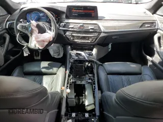 2018 BMW 5 Series M550i xDrive with VIN WBAJB9C55JB049384, listed as a Copart auction lot 54934435 with 79,061 mi miles and Non Repairable. Bid and sale history available at DreamBid. Image 8.