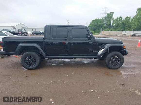 2023 Jeep Gladiator Overland with VIN 1C6JJTFM9PL593659, listed as a IAAI auction lot 42470253 with 34,374 mi miles and . Bid and sale history available at DreamBid. Image 13.