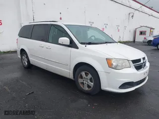 2012 Dodge Grand Caravan SXT with VIN 2C4RDGCG8CR321999, listed as a IAAI auction lot 41789662 with 214,043 mi miles. Bid and sale history available at carsss.com. Image 1.