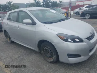 2009 Toyota Matrix with VIN 2T1KU40E49C130897, listed as a IAAI auction lot 42164096 with 140,273 mi miles. Bid and sale history available at carsss.com. Image 6.