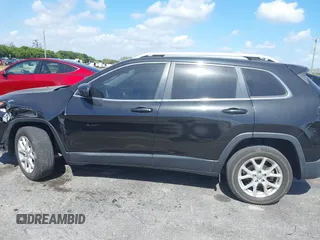 2015 Jeep Cherokee Latitude with VIN 1C4PJLCB4FW683904, listed as a IAAI auction lot 41579059 with 126,156 mi miles and . Bid and sale history available at carsss.com. Image 14.