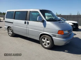 2002 Volkswagen EuroVan с VIN WV2KB47012H065431, выставлен на аукционе Copart как лот 49010445 с пробегом 78 985 миль миль и Чистый • Clean title. История ставок и продаж доступна на DreamBid. Изображение 4.