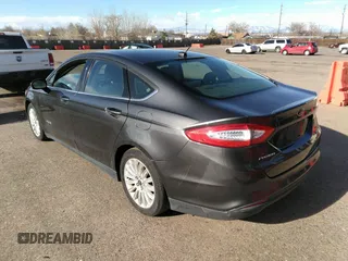 2015 Ford Fusion S Hybrid with VIN 3FA6P0UU6FR307898, listed as a IAAI auction lot 41717200 with 177,735 mi miles. Bid and sale history available at carsss.com. Image 3.