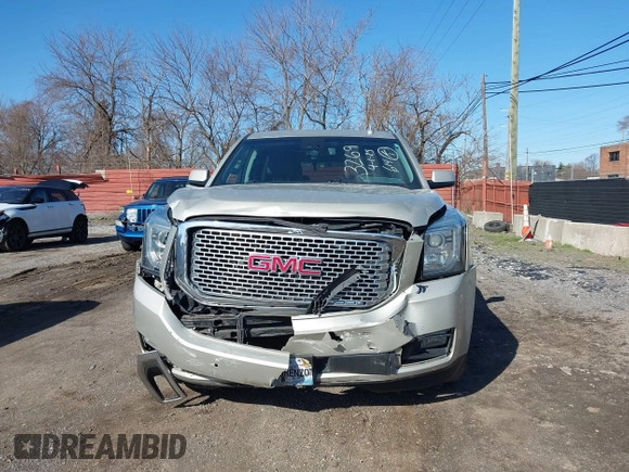 2016 GMC Yukon Denali with VIN 1GKS2CKJ5GR393269, listed as a IAAI auction lot 41963630 with 158,584 mi miles and . Bid and sale history available at DreamBid. Image 12.