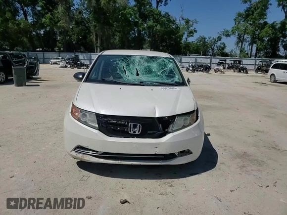 2015 Honda Odyssey LX with VIN 5FNRL5H27FB054746, listed as a Copart auction lot 53023405 with 96,548 mi miles and Salvage Title. Bid and sale history available at DreamBid. Image 12.