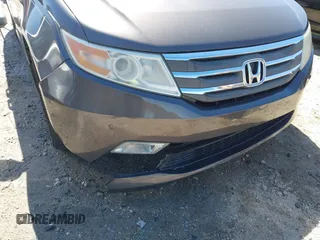 2012 Honda Odyssey Touring with VIN 5FNRL5H91CB057344, listed as a IAAI auction lot 41835272 with 158,854 mi miles. Bid and sale history available at carsss.com. Image 6.