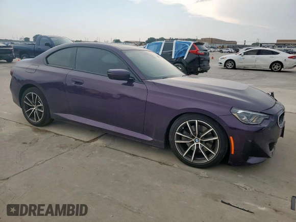 2023 BMW 2 Series 230i with VIN 3MW23CM05P8D73642, listed as a Copart auction lot 57884725 with 5,697 mi miles and Salvage title. Bid and sale history available at DreamBid. Image 4.