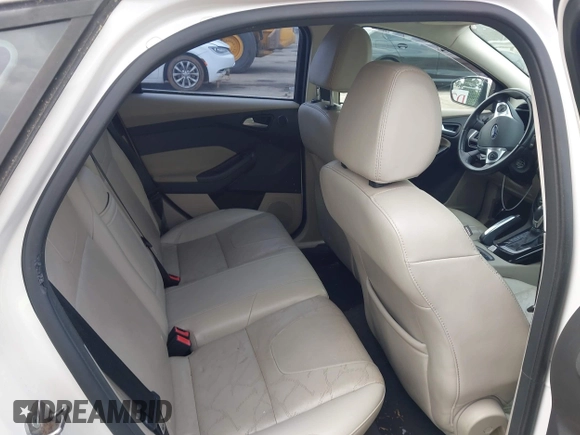 2013 Ford Focus Electric z VIN 1FADP3R46DL133781, wystawiony jako IAAI lot #42129143 z przebiegiem 114 041 mil mil oraz . Historia ofert i sprzedaży dostępna na DreamBid. Obrazek 8.