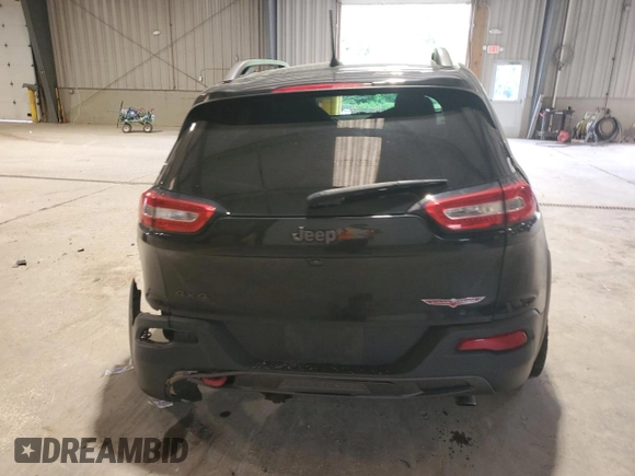 2016 Jeep Cherokee Trailhawk with VIN 1C4PJMBS4GW267375, listed as a Copart auction lot 58476005 with 116,151 mi miles and Salvage title. Bid and sale history available at DreamBid. Image 6.