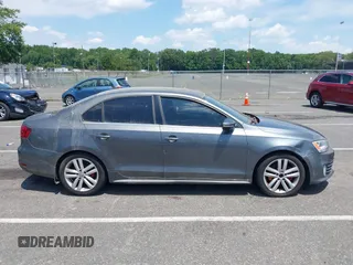 2014 Volkswagen Jetta GLI Autobahn with VIN 3VW5T7AJ6EM201416, listed as a IAAI auction lot 42684207 with 164,905 mi miles and . Bid and sale history available at DreamBid. Image 13.
