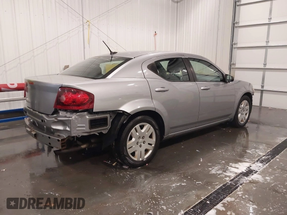 2014 Dodge Avenger SE z VIN 1C3CDZAB4EN228880, wystawiony jako IAAI lot #41605761 z przebiegiem 97 437 mil mil oraz . Historia ofert i sprzedaży dostępna na DreamBid. Obrazek 4.