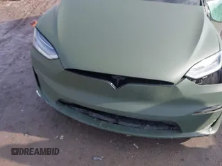 2022 Tesla Model X Plaid z VIN 7SAXCBE6XNF358023, wystawiony jako IAAI lot #41683857 z przebiegiem 42 821 mil mil oraz . Historia ofert i sprzedaży dostępna na DreamBid. Obrazek 10.