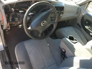 2002 Mazda B-Series 2WD Truck DS with VIN 4F4YR16U32TM11751, listed as a Copart auction lot 83734094 with 132,941 mi miles and Salvage Title. Bid and sale history available at carsss.com. Image 8.