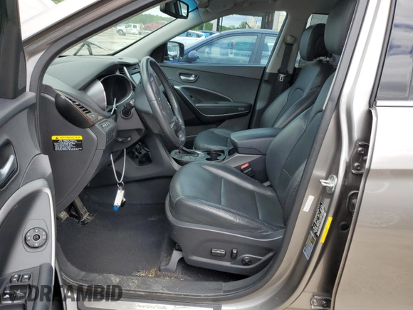 2017 Hyundai Santa Fe 2.0T with VIN 5XYZUDLA9HG437458, listed as a Copart auction lot 57751415 with 117,469 mi miles and Salvage title. Bid and sale history available at DreamBid. Image 7.