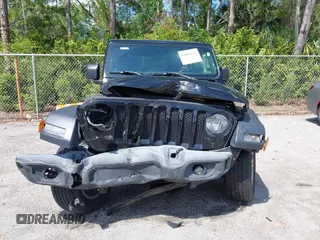 2020 Jeep Wrangler Unlimited Sport S z VIN 1C4HJXDN1LW223664, wystawiony jako IAAI lot #41886832 z przebiegiem 77 019 mil mil oraz . Historia ofert i sprzedaży dostępna na DreamBid. Obrazek 13.