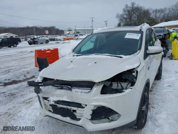2016 Ford Escape Titanium with VIN 1FMCU9J91GUB84625, listed as a IAAI auction lot 41607230 with 161,775 mi miles. Bid and sale history available at carsss.com. Image 18.