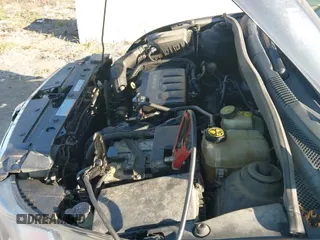 2016 Chevrolet Cruze LT z VIN 1G1PE5SB3G7120008, wystawiony jako IAAI lot #43240182 z przebiegiem 160 962 mil mil oraz . Historia ofert i sprzedaży dostępna na DreamBid. Obrazek 19.