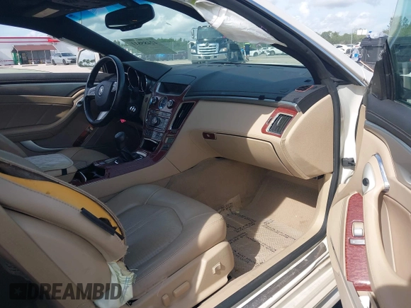 2014 Cadillac CTS Performance with VIN 1G6DC1E39E0132332, listed as a IAAI auction lot 42485811 with 109,899 mi miles and . Bid and sale history available at DreamBid. Image 5.