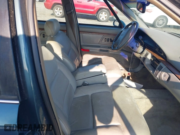 1995 Oldsmobile 98 Regency Elite Series I - 1SB z VIN 1G3CX52K4S4314539, wystawiony jako IAAI lot #42377503 z przebiegiem 125 856 mil mil oraz . Historia ofert i sprzedaży dostępna na DreamBid. Obrazek 5.