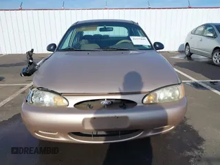 1999 Ford Escort LX with VIN 1FAFP10PXXW136402, listed as a IAAI auction lot 41375841 with 151,699 mi miles. Bid and sale history available at carsss.com. Image 13.