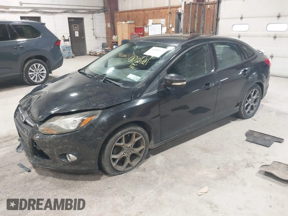 2014 Ford Focus SE with VIN 1FADP3F20EL114485, listed as a IAAI auction lot 41988373 with 119,963 mi miles. Bid and sale history available at carsss.com. Image 2.