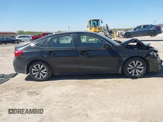 2022 Honda Civic LX z VIN 2HGFE2F20NH573453, wystawiony jako IAAI lot #41854126 z przebiegiem 34 289 mil mil oraz . Historia ofert i sprzedaży dostępna na DreamBid. Obrazek 13.