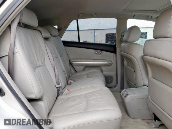 2006 Lexus RX 400h with VIN JTJGW31U762000555, listed as a Copart auction lot 54873185 with 191,579 mi miles and Salvage title. Bid and sale history available at DreamBid. Image 11.