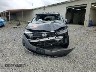 2023 Honda Odyssey Elite with VIN 5FNRL6H98PB056770, listed as a Copart auction lot 56984055 with Not provided miles and Salvage title. Bid and sale history available at DreamBid. Image 14.