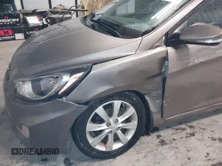 2013 Hyundai Accent SE with VIN KMHCU5AE6DU097353, listed as a IAAI auction lot 41937225 with 173,447 mi miles. Bid and sale history available at carsss.com. Image 6.