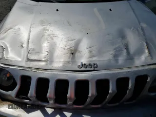 2009 Jeep Patriot Sport z VIN 1J4FT28A59D167643, wystawiony jako Copart lot #49856125 z przebiegiem 186 838 mil mil oraz Szkoda całkowita • Salvage title. Historia ofert i sprzedaży dostępna na DreamBid. Obrazek 11.