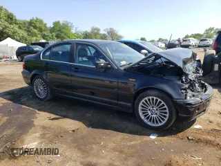 2003 BMW 3 Series 330xi with VIN WBAEW53413PG21999, listed as a Copart auction lot 60724374 with 137,242 mi miles and Salvage Title. Bid and sale history available at carsss.com. Image 4.