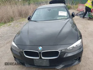 2014 BMW 3 Series 320i xDrive with VIN WBA3C3G5XENS68374, listed as a IAAI auction lot 42042243 with 107,830 mi miles. Bid and sale history available at carsss.com. Image 12.