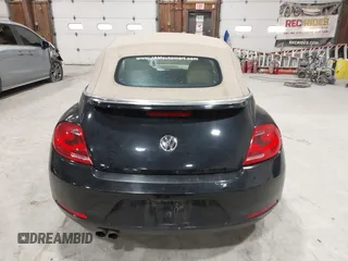 2014 Volkswagen Beetle 1.8T с VIN 3VW517AT5EM818796, выставлен на аукционе IAAI как лот 42318653 с пробегом 150 443 миль миль и . История ставок и продаж доступна на DreamBid. Изображение 16.