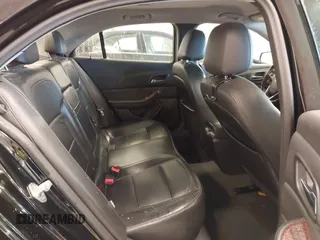 2013 Chevrolet Malibu LTZ with VIN 1G11H5SA1DU129095, listed as a IAAI auction lot 41556006 with 170,477 mi miles and . Bid and sale history available at DreamBid. Image 8.