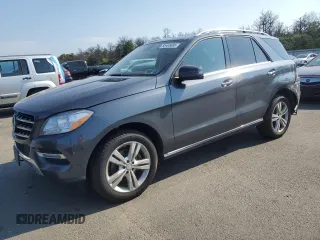 2015 Mercedes-Benz M 350 with VIN 4JGDA5HB2FA555743, listed as a Copart auction lot 65165695 with 147,152 mi miles and Salvage title. Bid and sale history available at DreamBid. Image 1.