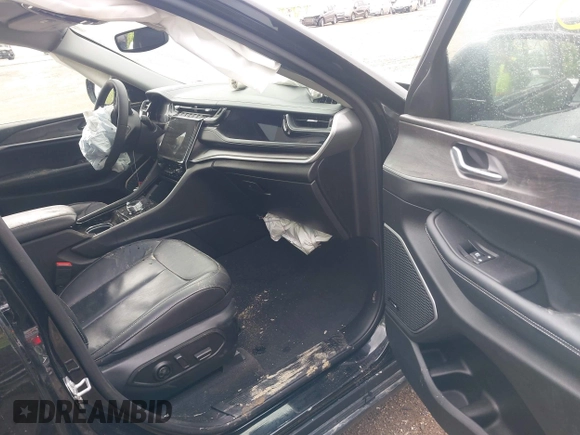 2022 Jeep Grand Cherokee with VIN 1C4RJYB69N8715243, listed as a IAAI auction lot 42319323 with 23,405 mi miles and . Bid and sale history available at DreamBid. Image 5.