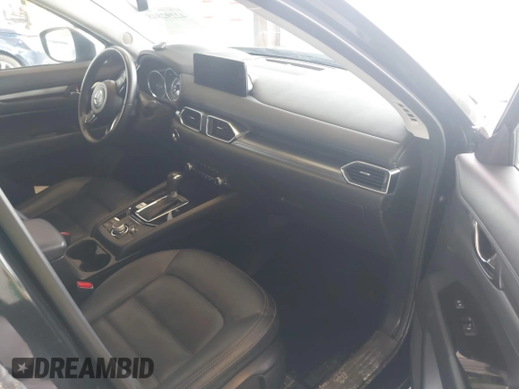 2023 Mazda CX-5 S Carbon Edition z VIN JM3KFBCM8P0140333, wystawiony jako IAAI lot #42292848 z przebiegiem 49 587 mil mil oraz . Historia ofert i sprzedaży dostępna na DreamBid. Obrazek 5.