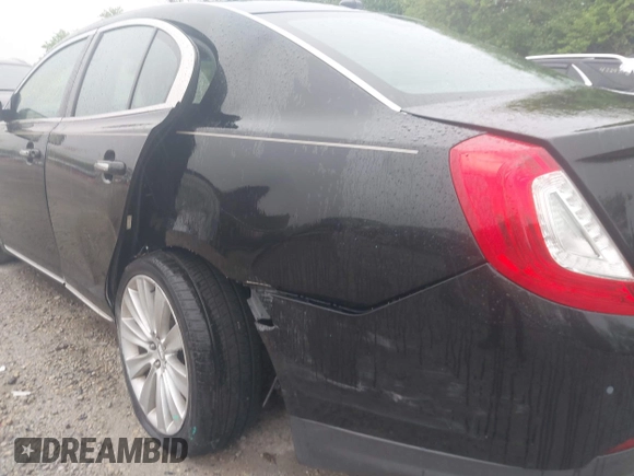 2013 Lincoln MKS EcoBoost with VIN 1LNHL9FT4DG607785, listed as a IAAI auction lot 42279833 with 126,548 mi miles and . Bid and sale history available at DreamBid. Image 17.