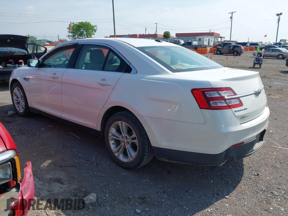 2014 Ford Taurus SEL with VIN 1FAHP2E84EG141795, listed as a IAAI auction lot 42133668 with 154,009 mi miles and . Bid and sale history available at DreamBid. Image 3.