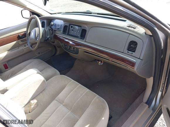 2003 Mercury Grand Marquis GS Convenience with VIN 2MEFM74W43X681774, listed as a IAAI auction lot 42057422 with 218,422 mi miles. Bid and sale history available at carsss.com. Image 5.