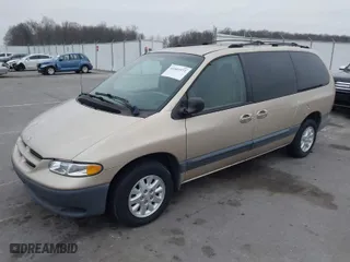 1999 Dodge Caravan SE with VIN 1B4GP44G8XB880093, listed as a IAAI auction lot 41501972 with 179,018 mi miles. Bid and sale history available at carsss.com. Image 2.